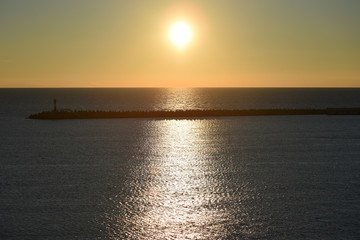 Sunset in the sea port of Sochi