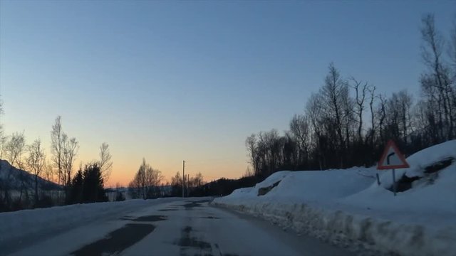 Driving on an icy road in winter