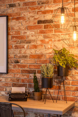 Fototapeta na wymiar Home office with brick wall
