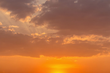 Colorful dramatic sky with cloud at sunset.Sky with sun background