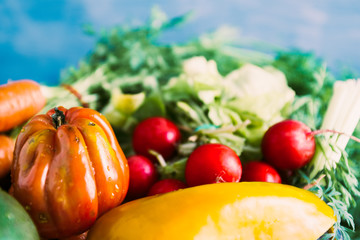 Fresh carrots on old white table top view