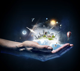 Little world in hands . Mixed media