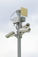CCTV camera group attached on iron post for security purpose
