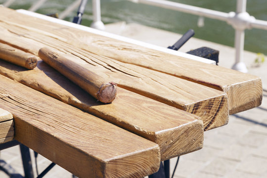 Txalaparta outdoors, in a sunny day. The txalaparta is a percussion musical instrument, a specialized Basque music device made of wood or stone.