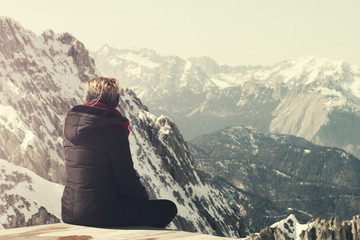 Unrecognizable Girl Looking to the Mountain Landscape. Toning. Traveling or Vacation Concept. Alps. Austria.