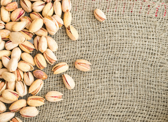 Heap of Inshell Pistachios on Canvas Background