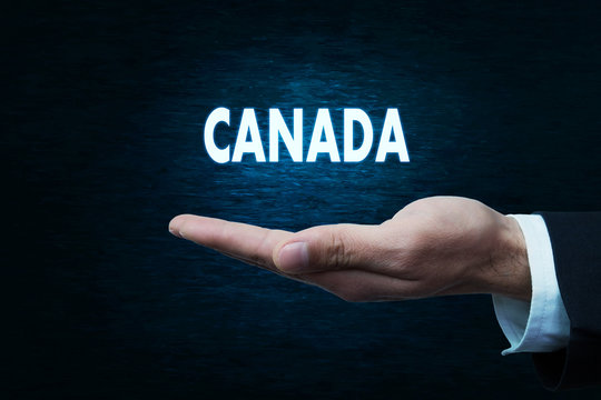 Hand with word Canada