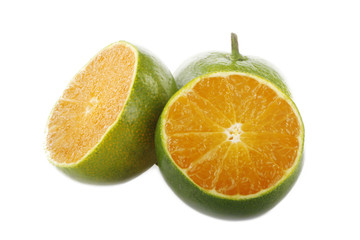 Fototapeta na wymiar green tangerine slice isolated on white
