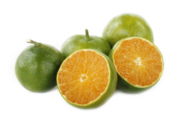 Obraz na płótnie Canvas green tangerine slice isolated on white