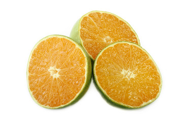 green tangerine slice isolated on white