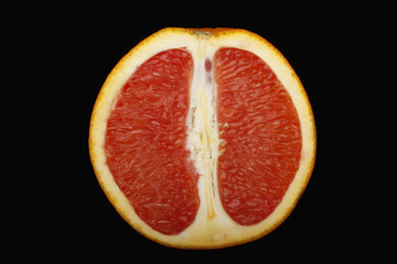 red orange slice isolated on black background