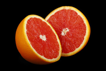 red orange slices isolated on black background