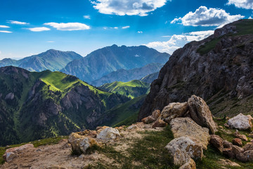 Fototapeta na wymiar Good weather in the mountains. Moldo-Ashuu Pass. Central Asia