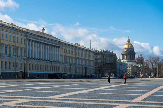 April 13, 2015 - St.Petersburg Russia : Tourists walking on the Palace square infront of Hermitage museum on a sunny day