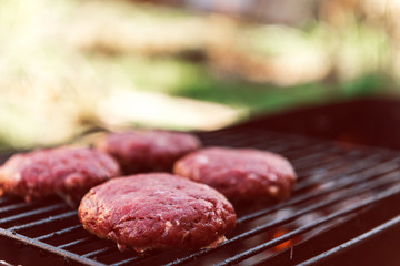 Juicy burger cutlets for burger are grilled