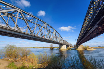 The historic pair of bridges over Vistula river, a road one and a railroad one. The bridges are 837 meters long. Tczew, Poland. Europe.