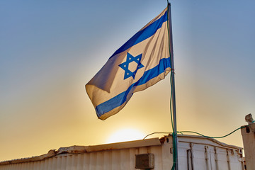 Israel flag at sunset