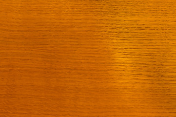 Fototapeta premium Texture of wood, oak, under varnish. Red, orange.