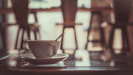 Hot Cappuccino coffee in white cup.