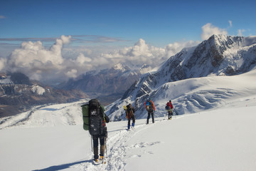 A group of climbers descends to the base camp, Pamir