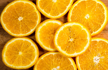Obraz premium Background of sliced juicy oranges fruit