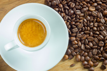 Coffee cup and coffee beans