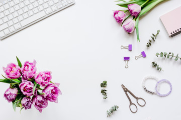 Trendy design of workdesk with blossom on white background top view mock-up