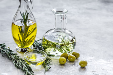 jar with oil with olives on stone table background mockup