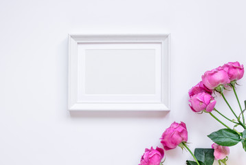 present design with peony bouquet and white frame top view mock up