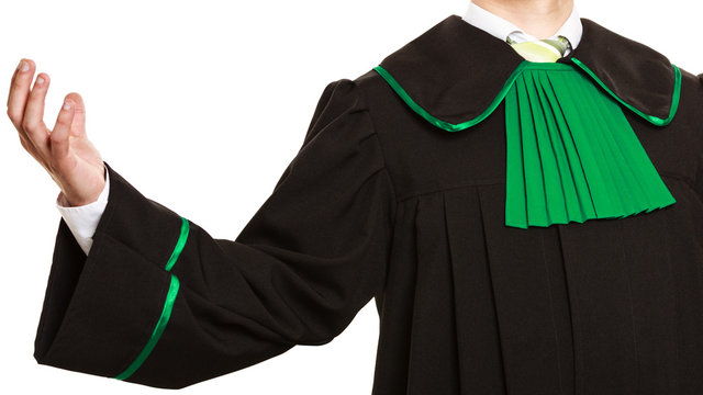 Male lawyer hold arm in air make gesture.
