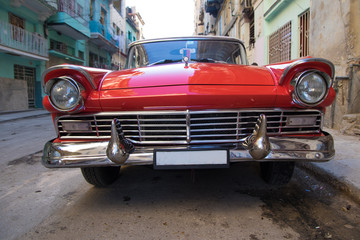 Red oldtimer car in Havana