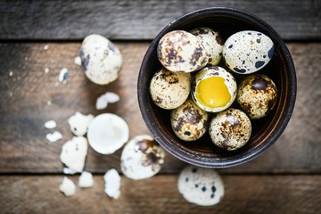 Quail eggs in a small bowl