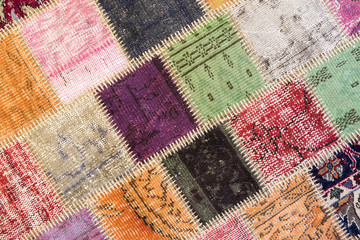 Texture of a piece of old carpet to sew thick threads 