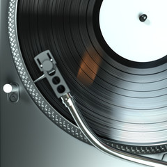 Tonabnehmer eines Plattenspielers auf einer drehenden Schallplatte