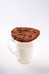 American biscuits with chocolate, a glass of milk isolated