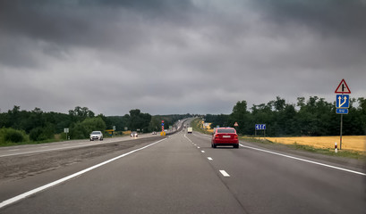 Landscape with countryside highway at summer in Russia.