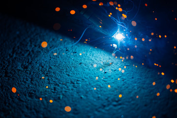 artistic welding sparks light, industrial background