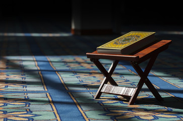 Quran - the holy islamic book on the lauh in the Malaysian mosque