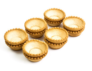 Tartlets empty on white background