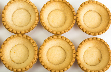 Tartlets empty on white background