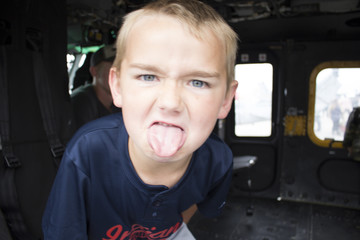 boy sticking tongue out © p.koz