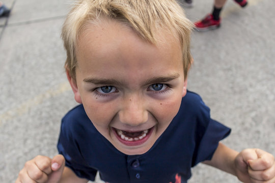 Boy With Mischevious Laugh