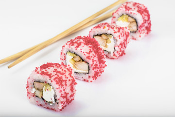 Various sushi rolls on white background