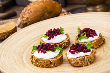 Bruschetta with cheese and beet