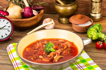 Vegetarian vegetable soup with beet, broccoli and tomatoes
