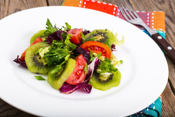 Healthy food mix of lettuce with tomatoes