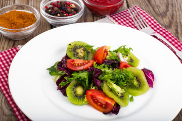 Healthy food mix of lettuce with tomatoes