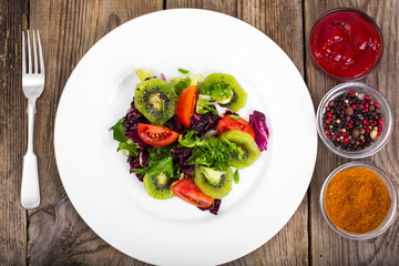 Healthy food mix of lettuce with tomatoes