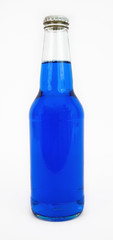 Clear glass bottle filled with blue liquid. isolated. Vertical.