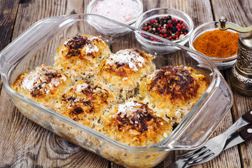 Baked meatballs with rice and vegetables in glass form